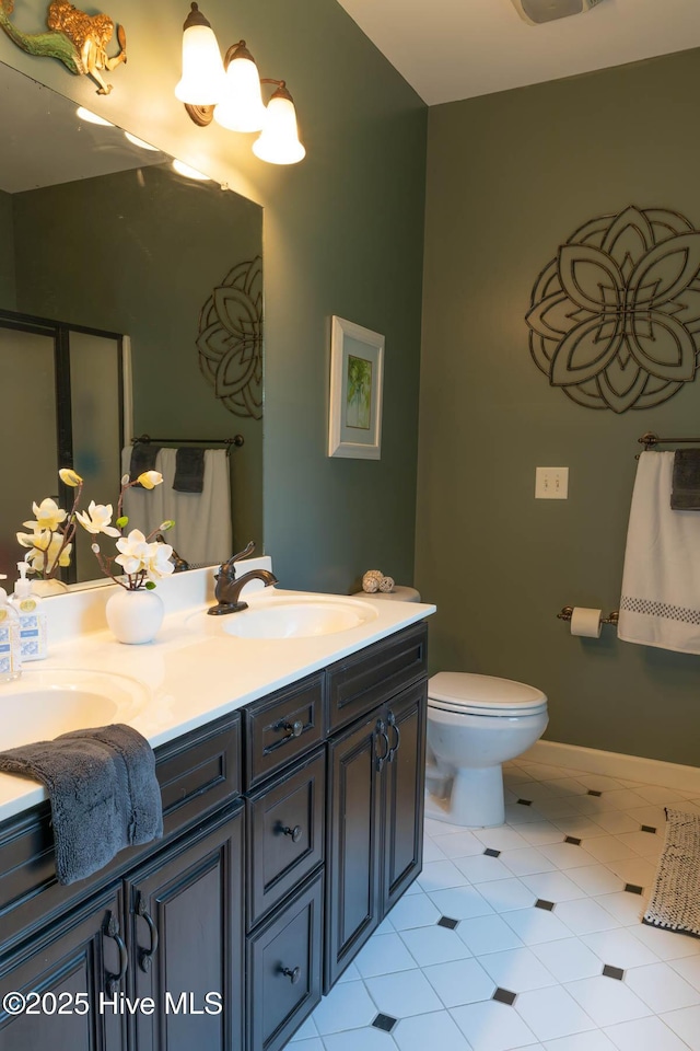 1113 Palmer Way, Morehead City, NC 28557 - bathroom featuring double vanity and tile patterned flooring