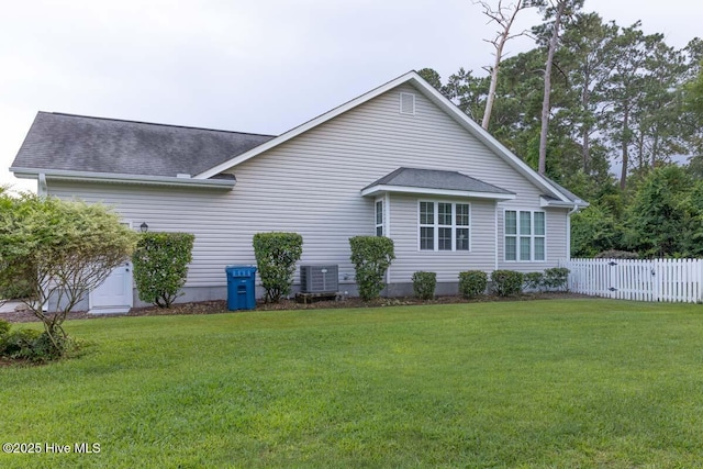 1113 Palmer Way, Morehead City, NC 28557 - view of side of home with a shingled roof and a cooling unit