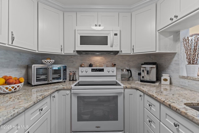 241 Saint James Ct, Wilmington, NC 28409 - kitchen with white appliances, white cabinetry, and decorative backsplash