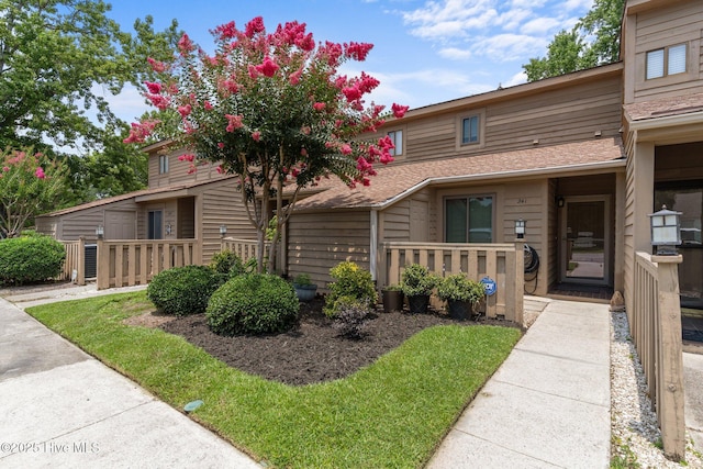 241 Saint James Ct, Wilmington, NC 28409 - view of front of house featuring roof with shingles