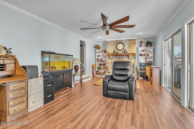 198 Verona Rd, Jacksonville, NC 28540 - living area featuring a ceiling fan, light wood-style flooring, crown molding, and a brick fireplace