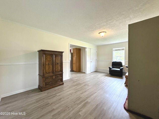 226 Community Rd, Lillington, NC 27546 - living area with a textured ceiling, wood finished floors, and ornamental molding