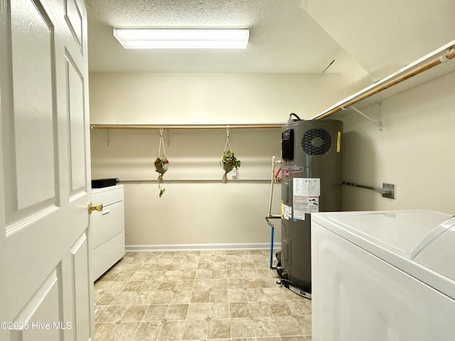 226 Community Rd, Lillington, NC 27546 - laundry area featuring washer and clothes dryer and heat pump water heater
