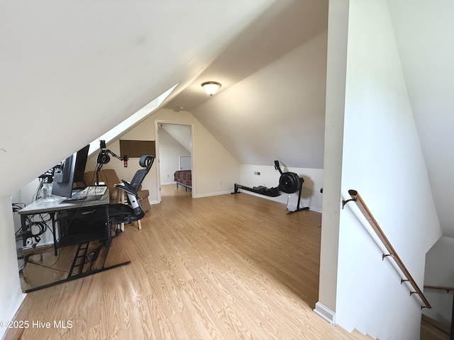 226 Community Rd, Lillington, NC 27546 - additional living space featuring wood finished floors and lofted ceiling