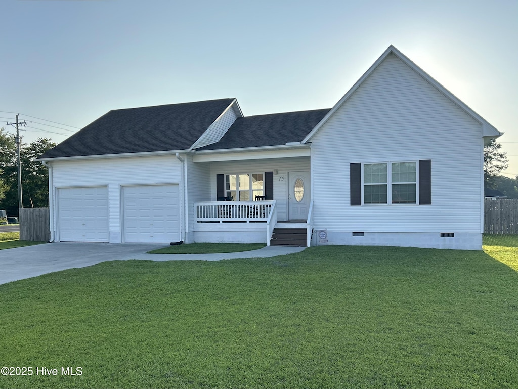 15 Bless Ave, Bolton, NC 28423 - view of front of house featuring a porch, crawl space, concrete driveway, and an attached garage