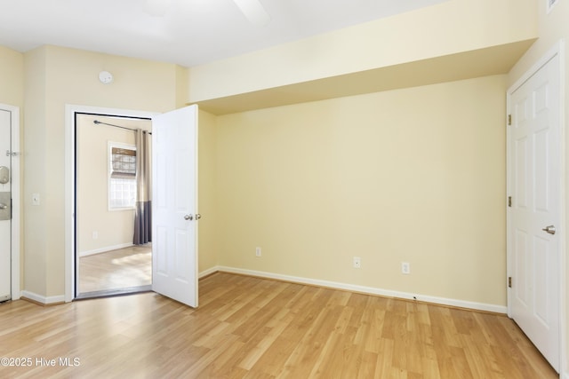 215 Royal Poste Rd Unit 2709, Sunset Beach, NC 28468 - unfurnished bedroom with light wood-style floors and baseboards