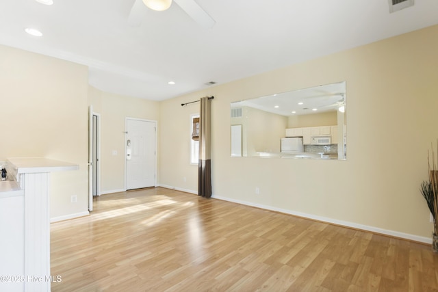215 Royal Poste Rd Unit 2709, Sunset Beach, NC 28468 - unfurnished living room with a ceiling fan, light wood finished floors, and recessed lighting