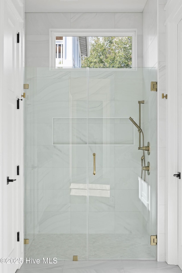 1320 Searay Ln, Carolina Beach, NC 28428 - bathroom with a stall shower and healthy amount of natural light