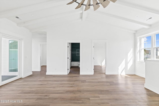 1320 Searay Ln, Carolina Beach, NC 28428 - unfurnished living room featuring light wood-type flooring and baseboards