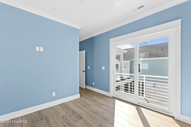 1320 Searay Ln, Carolina Beach, NC 28428 - spare room with wood finished floors and baseboards