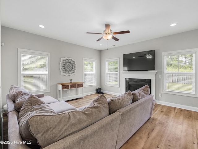 510 Transom Way, Sneads Ferry, NC 28460 - living room featuring ceiling fan, a fireplace, light wood-style floors, and recessed lighting