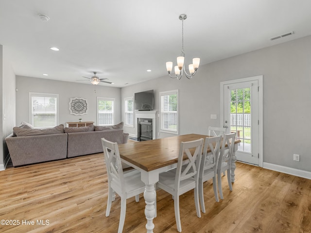 510 Transom Way, Sneads Ferry, NC 28460 - dining area featuring plenty of natural light, a fireplace, ceiling fan, light wood finished floors, and recessed lighting