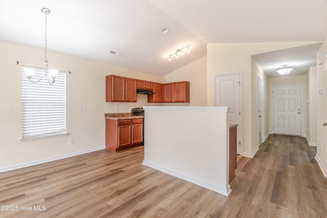 3021 Evening Rd, Castle Hayne, NC 28429 - kitchen with brown cabinetry, a chandelier, light wood-type flooring, vaulted ceiling, and pendant lighting