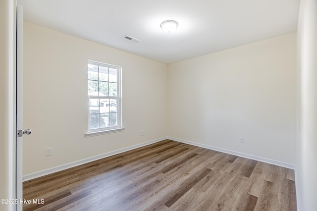 3021 Evening Rd, Castle Hayne, NC 28429 - empty room featuring wood finished floors and baseboards
