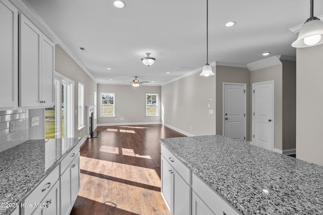 701 Plymouth Dr, Greenville, NC 27858 - kitchen with recessed lighting, decorative backsplash, dark wood-type flooring, crown molding, and ceiling fan