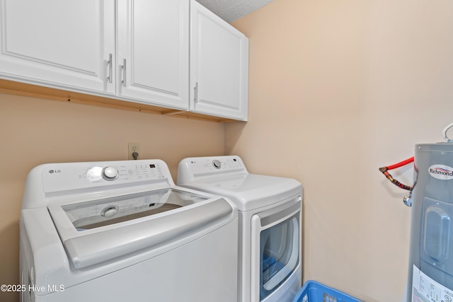 811 Colony Pl # D, Sunset Beach, NC 28468 - washroom featuring independent washer and dryer, water heater, and cabinet space