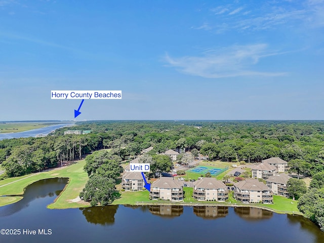811 Colony Pl # D, Sunset Beach, NC 28468 - drone / aerial view of a nearby body of water and a golf club