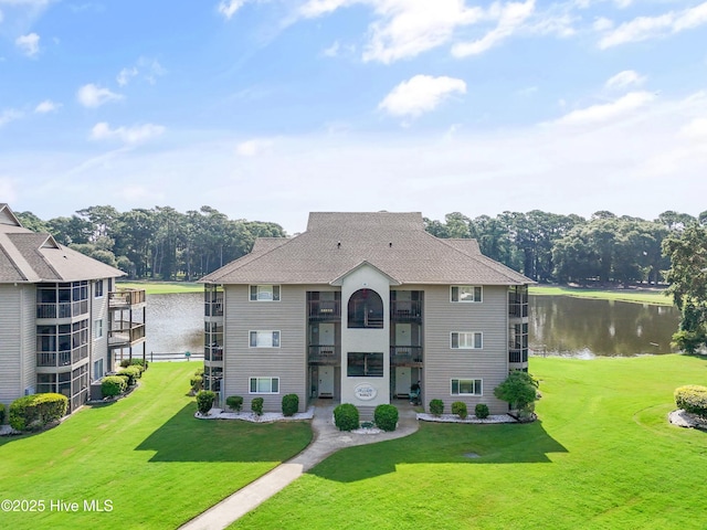811 Colony Pl # D, Sunset Beach, NC 28468 - view of building exterior with a water view