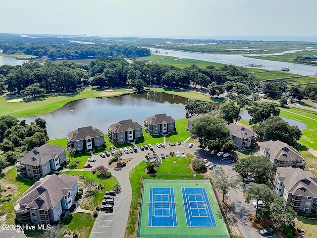 811 Colony Pl # D, Sunset Beach, NC 28468 - aerial perspective of suburban area featuring a large body of water and a golf club