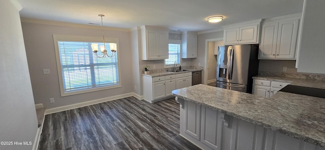 196 Asheberne Dr, Washington, NC 27889 - kitchen featuring stainless steel appliances, white cabinetry, crown molding, a chandelier, and dark wood-style flooring