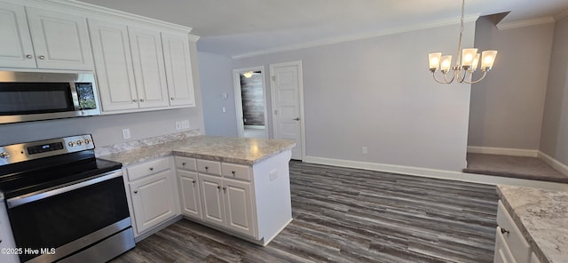 196 Asheberne Dr, Washington, NC 27889 - kitchen with stainless steel appliances, a chandelier, dark wood-style floors, ornamental molding, and white cabinetry