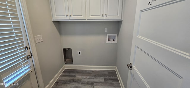 196 Asheberne Dr, Washington, NC 27889 - washroom featuring dark wood-type flooring, washer hookup, electric dryer hookup, and cabinet space