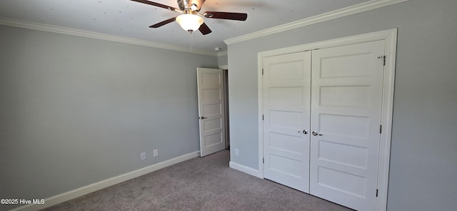 196 Asheberne Dr, Washington, NC 27889 - unfurnished bedroom with carpet floors, crown molding, a closet, and a ceiling fan