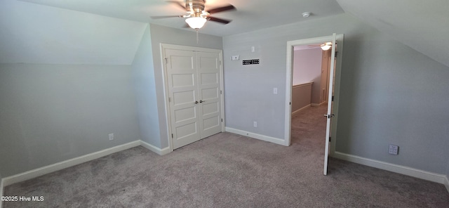 196 Asheberne Dr, Washington, NC 27889 - unfurnished bedroom featuring vaulted ceiling, carpet, and ceiling fan