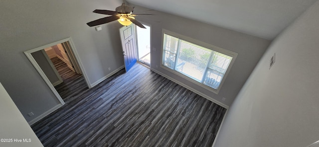 196 Asheberne Dr, Washington, NC 27889 - unfurnished living room featuring plenty of natural light, dark wood finished floors, ceiling fan, and vaulted ceiling