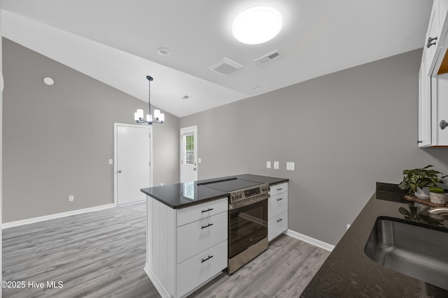 6739 Newbury Way, Wilmington, NC 28411 - kitchen with stainless steel electric stove, a peninsula, light wood-style floors, white cabinets, and a chandelier