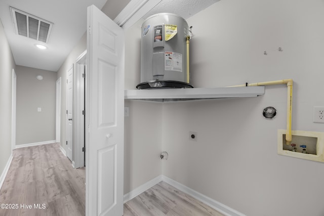 6739 Newbury Way, Wilmington, NC 28411 - laundry area featuring washer hookup, water heater, wood finished floors, and hookup for an electric dryer