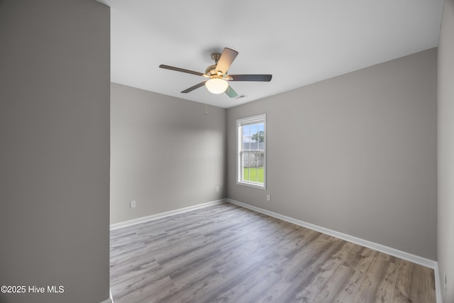 6739 Newbury Way, Wilmington, NC 28411 - spare room featuring wood finished floors and a ceiling fan