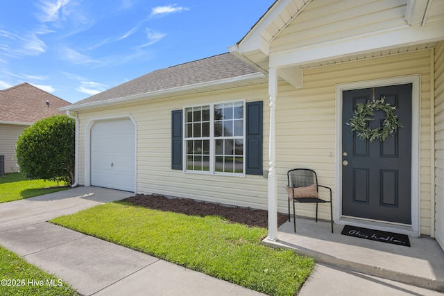 6739 Newbury Way, Wilmington, NC 28411 - doorway to property with roof with shingles, driveway, and an attached garage