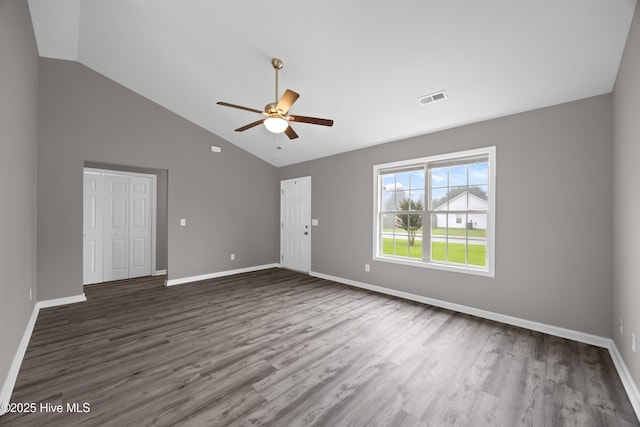 6739 Newbury Way, Wilmington, NC 28411 - unfurnished living room featuring a ceiling fan, wood finished floors, and high vaulted ceiling