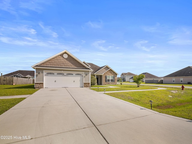 206 Riverstone Ct, Jacksonville, NC 28546 - craftsman-style home featuring stone siding, concrete driveway, an attached garage, and a residential view