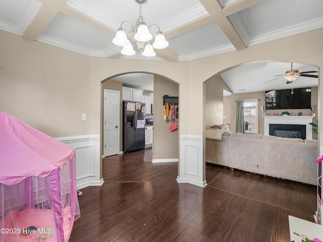 206 Riverstone Ct, Jacksonville, NC 28546 - living room with arched walkways, coffered ceiling, a ceiling fan, a chandelier, and dark wood finished floors