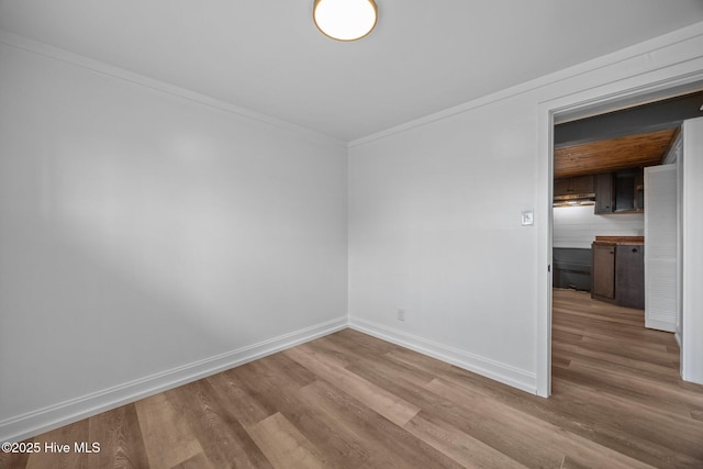 1955 Banks School Rd, Kinston, NC 28504 - unfurnished room featuring wood finished floors and crown molding
