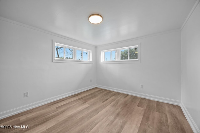 1955 Banks School Rd, Kinston, NC 28504 - spare room with plenty of natural light, wood finished floors, and crown molding