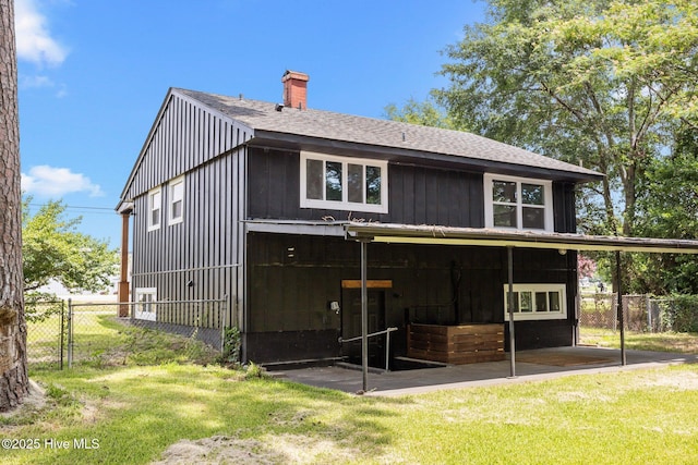 1955 Banks School Rd, Kinston, NC 28504 - back of property with a chimney and a shingled roof