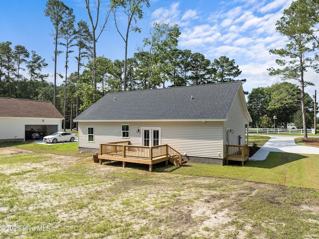 1034 Powers Ln, Winterville, NC 28590 - rear view of house with a deck and a shingled roof