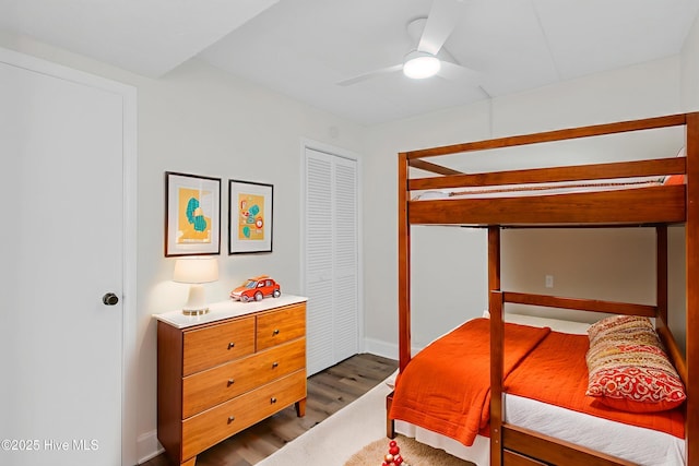 222 Carolina Beach Ave N Unit 230, Carolina Beach, NC 28428 - bedroom with dark wood-style floors, ceiling fan, and a closet