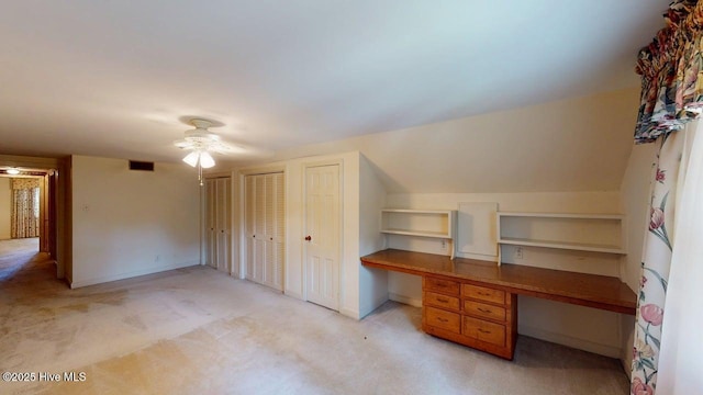707 S Claiborne St, Goldsboro, NC 27530 - unfurnished office with ceiling fan, light carpet, and built in desk