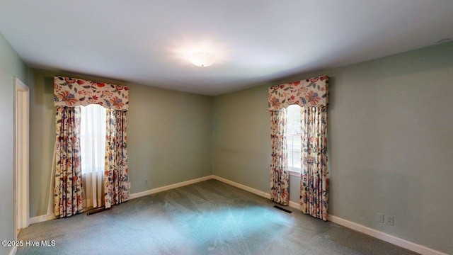 707 S Claiborne St, Goldsboro, NC 27530 - spare room with carpet and baseboards