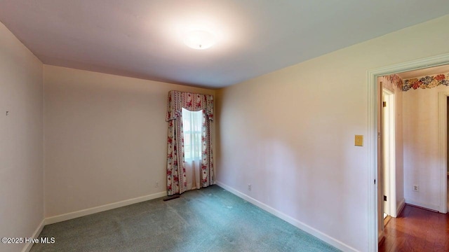 707 S Claiborne St, Goldsboro, NC 27530 - empty room with baseboards