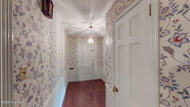 707 S Claiborne St, Goldsboro, NC 27530 - hallway featuring wallpapered walls and dark wood-style floors