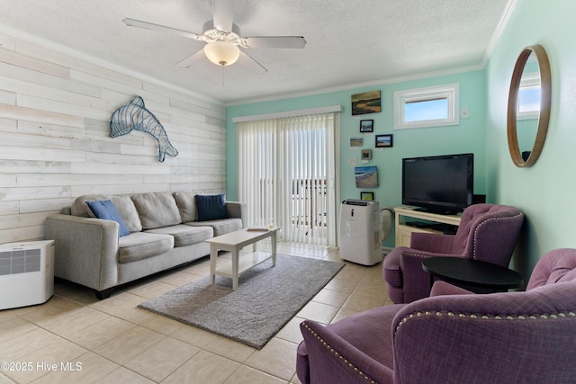 2224 New River Inlet Rd Unit 233, North Topsail Beach, NC 28460 - living room featuring plenty of natural light, a textured ceiling, crown molding, a ceiling fan, and light tile patterned floors