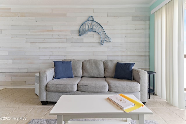 2224 New River Inlet Rd Unit 233, North Topsail Beach, NC 28460 - living area with light tile patterned floors, wooden walls, and ornamental molding