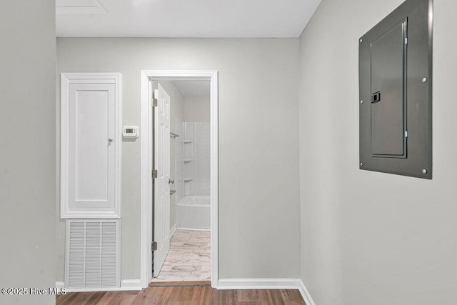 721 New River Dr, Jacksonville, NC 28540 - corridor featuring electric panel and marble look tile flooring