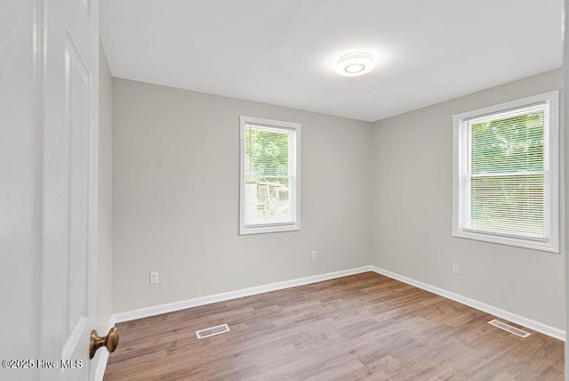 721 New River Dr, Jacksonville, NC 28540 - unfurnished room with wood finished floors