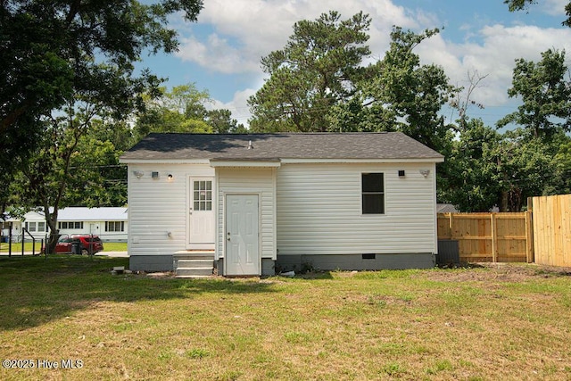 721 New River Dr, Jacksonville, NC 28540 - back of house with crawl space and a shingled roof